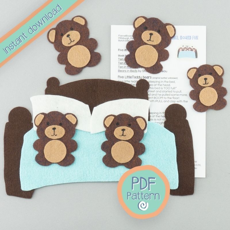 five felt bears and bed on desk with PDF pattern text