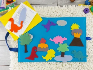 felt dinosaurs spread on felt play mat
