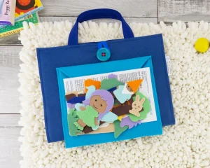 folded felt play mat with felt fairy pieces